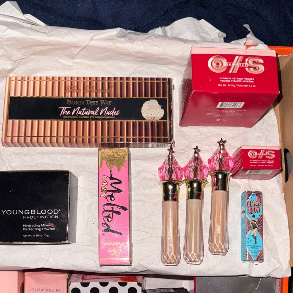 Too Faced Makeup Collection with Pink and Gold Accents